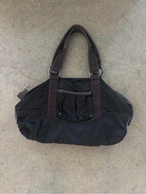 Black Shoulder Bag with Dark Brown Canvas Handles and Silver Hardware